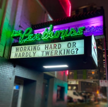 Strip club The Penthouse sign in 2023 - Working hard or hardly twerking?